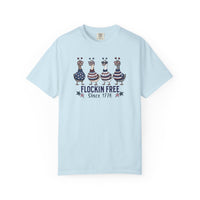 Load image into Gallery viewer, Chambray blue t-shirt with a graphic of four birds and text on a white background