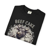 Load image into Gallery viewer, Folded Black t-shirt with a bull graphic and 'BEEF CAKE' text on a white background