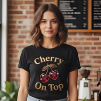 Load image into Gallery viewer, Woman wearing a black t-shirt with 'Cherry On Top' design in a casual setting.