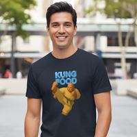 Load image into Gallery viewer, Man wearing a black t-shirt with 'Kung Food' graphic design outdoors.